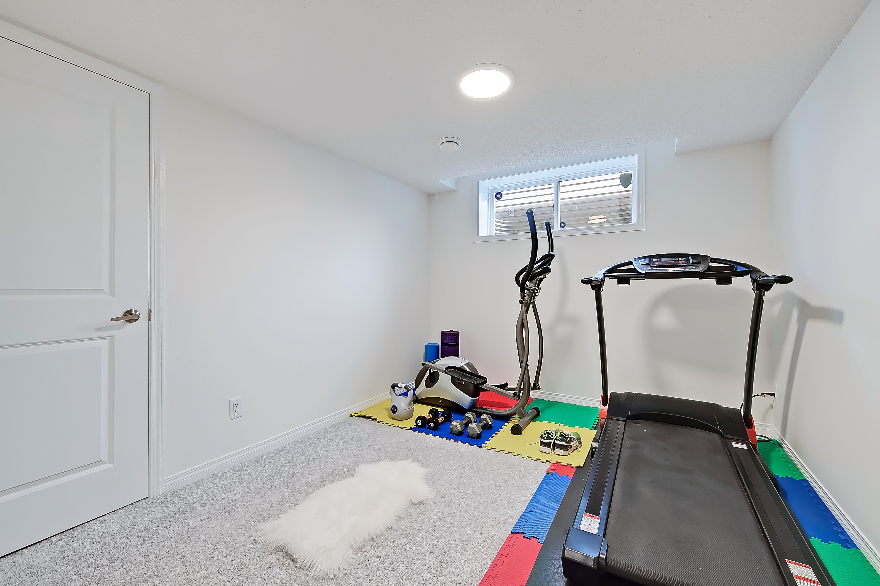 Basement gym / playroom 19 Everbrook Cres copy.jpeg
