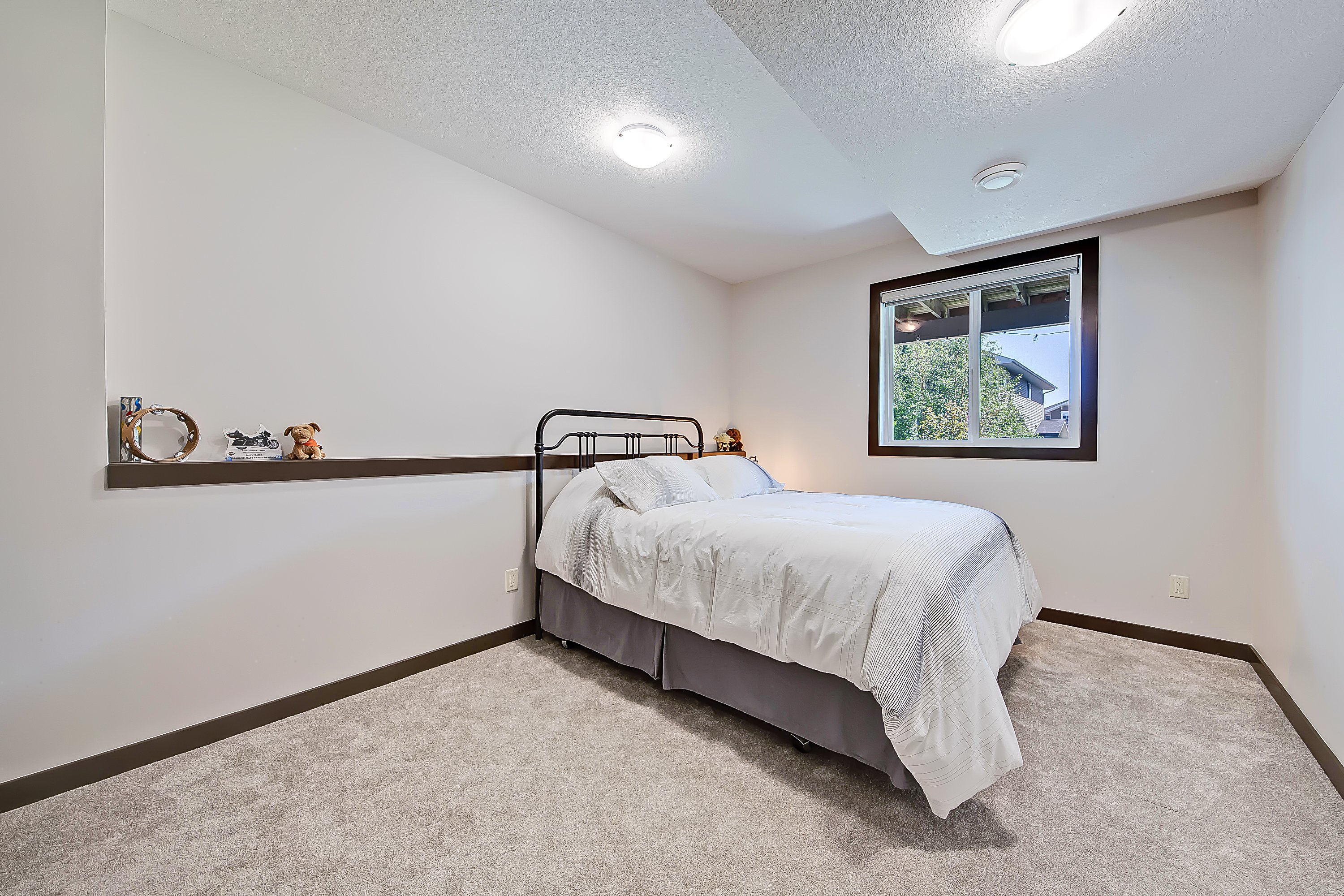 Basement bedroom 23 Jumping Pound Rise copy.jpeg
